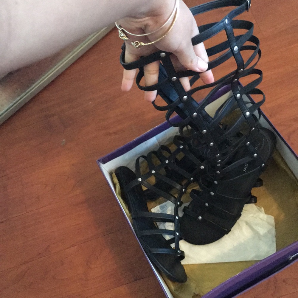 Black leather gladiator sandals